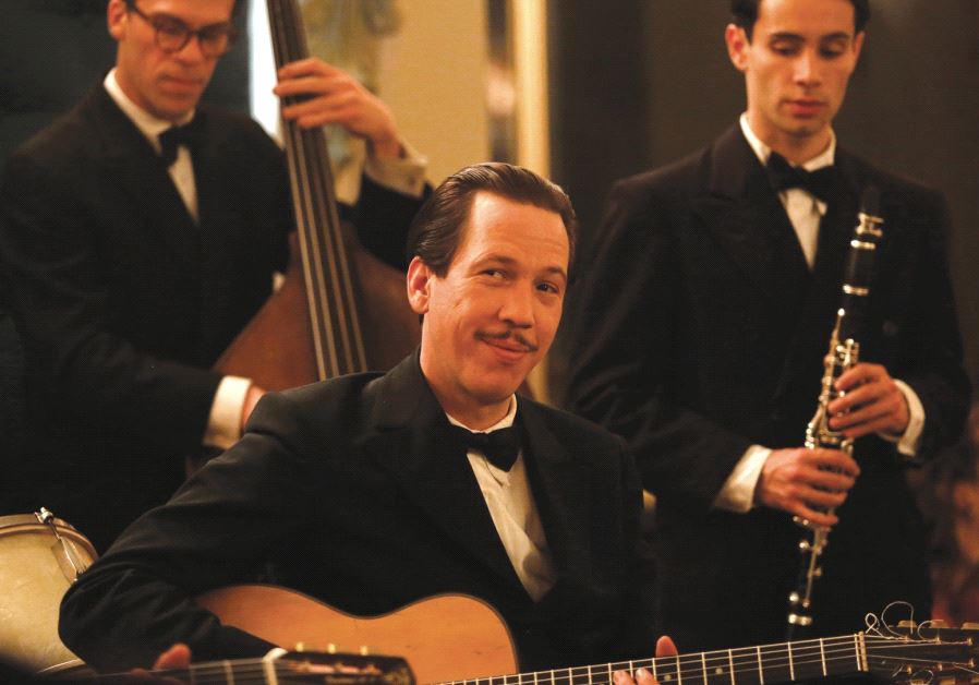 REDA KATEB (center) stars as the title character in Etienne Comar’s ‘Django’ 