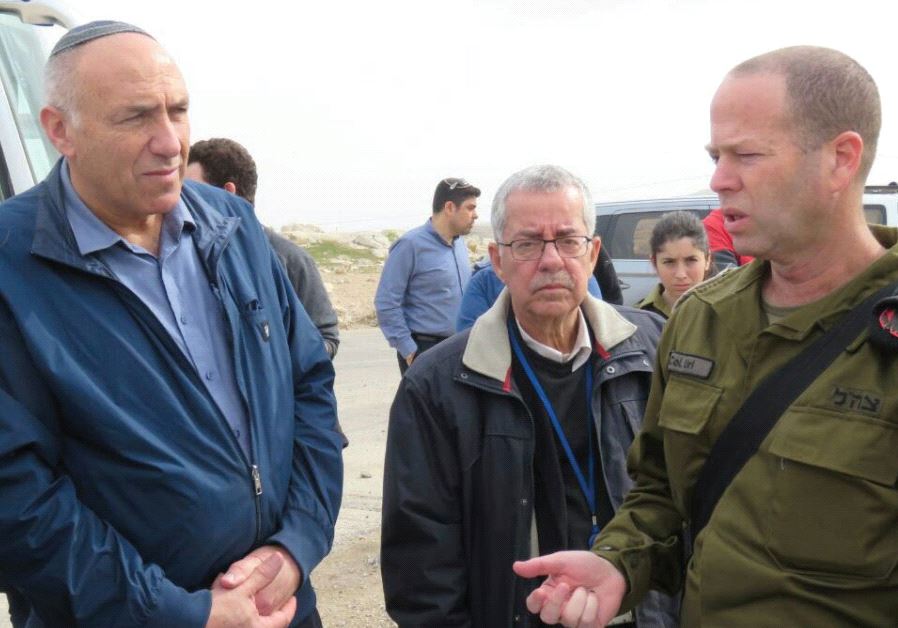 MK MOTI YOGEV listens to a colonel during a tour of Judea and Samaria last month.