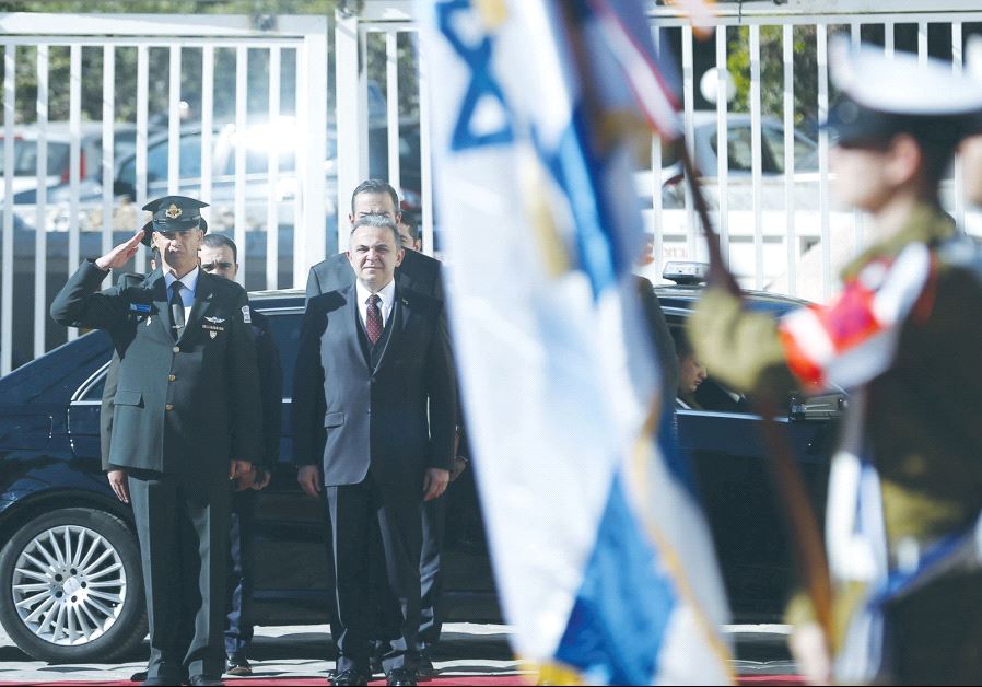 TURKISH AMBASSADOR Kemal Okem stands at attention for the Turkish national anthem before presenting his credentials to President Reuven Rivlin on December 12, 2016.