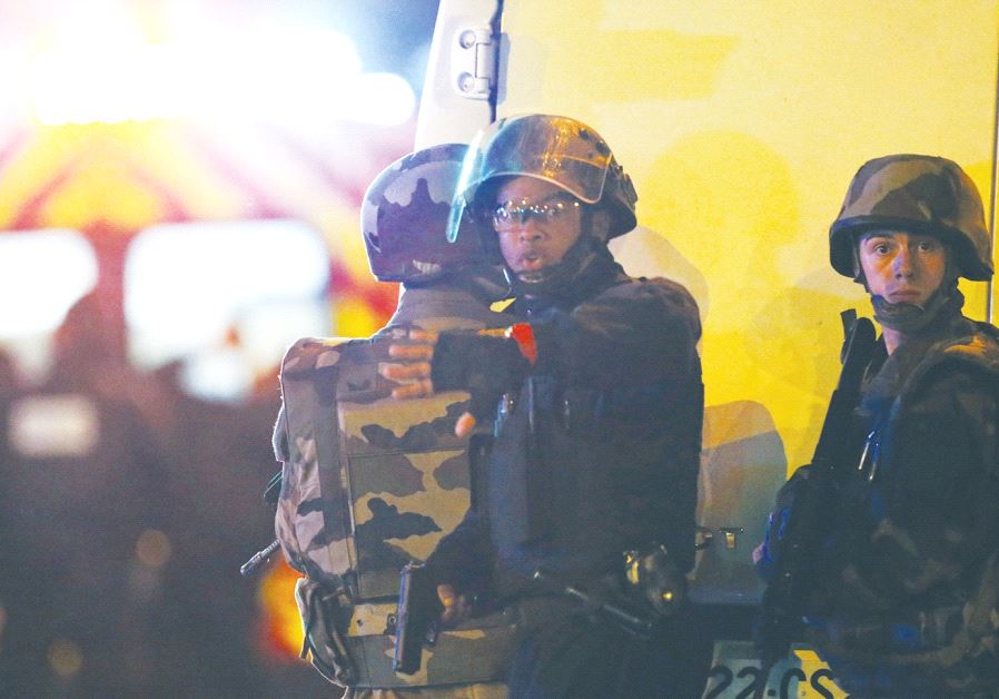 French police are seen outside the Bataclan concert hall where terrorists killed 89 people in November 2015.