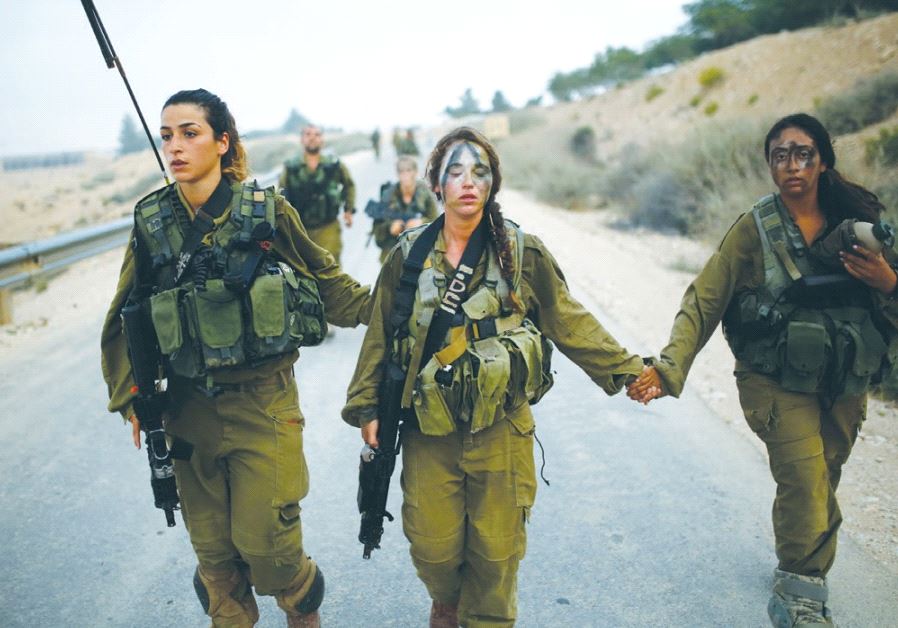 CARACAL BATTALION soldiers march in the Negev in 2014.