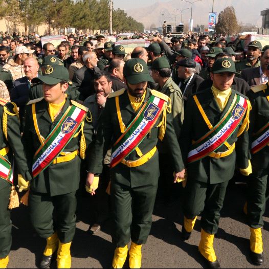 Iranian Revolutionary Guard members in Tehran carry the casket of Iran Revolutionary Guards Brigadier General Mohsen Ghajarian, who was killed in the northern province of Aleppo , Syria 