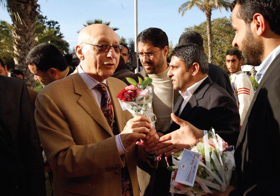 HAMAS LAWMAKERS welcome MP Gerald Kaufman upon his arrival at the Rafah border crossing in the southern Gaza Strip in 2010