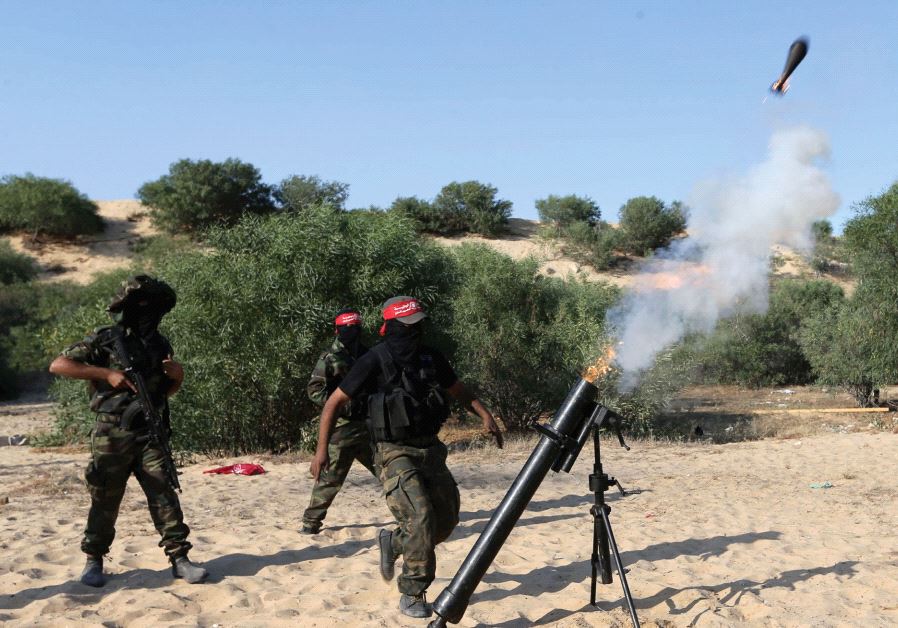 PALESTINIANS FIRE a mortar shell in the southern Gaza Strip in 2015