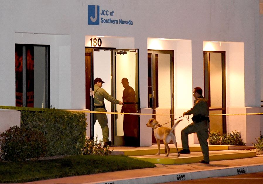  Las Vegas Metropolitan Police Department K-9 officers search the Jewish Community Center of Southern Nevada after an employee received a suspicious phone call that led about 10 people to evacuate the building on February 27, 2017 in Las Vegas, Nevada. 