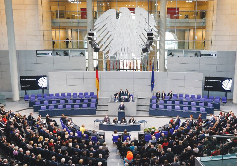 GERMAN PRESIDENT-ELECT Frank-Walter Steinmeier gives a speech after the first round of voting in the German presidential election at the Reichstag in Berlin last month. But are dark, undemocratic clouds gathering?