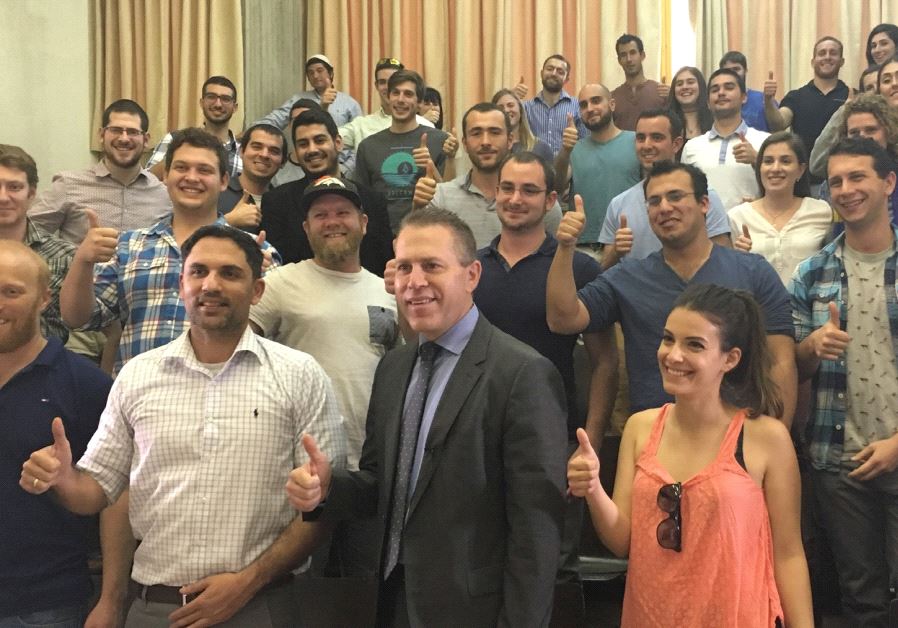 A GROUP of IDF reservists pose yesterday with Public Security and Strategic Affairs Minister Gilad Erdan (center) at a two-day seminar teaching how to combat BDS.