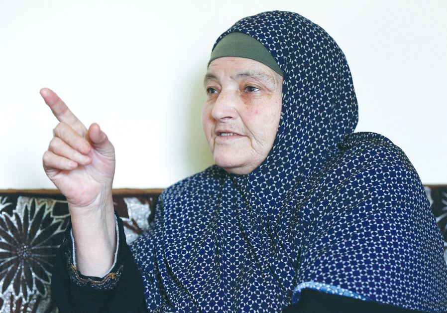 KAMLEH DAQAMSEH, mother of the Jordanian soldier convicted of killing seven Israeli schoolgirls in March 1997, speaks to the media at her home in the village of Ibdir yesterday after her son’s release