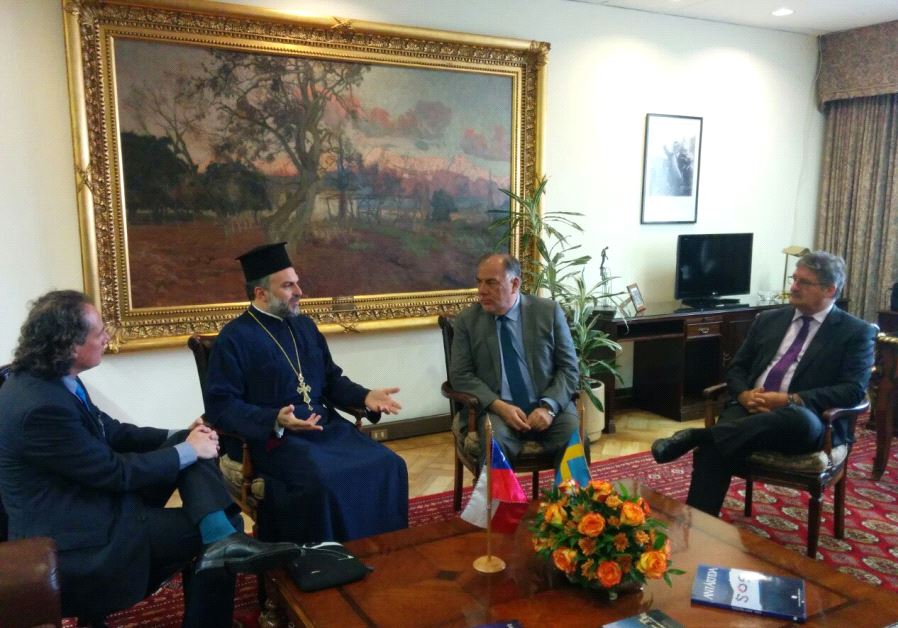 Father Naddaf meets last week with Osvaldo Andrade (second right), the head of the Chamber of Deputies, Chile's lower house of Congress
