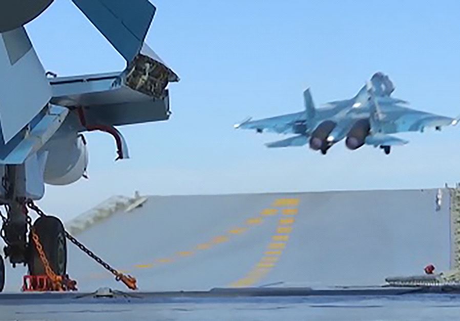 An image grab taken from a video footage made available on the Russian Defence Ministry's official website on November 15, 2016, reportedly shows a jet taking off from the Admiral Kuznetsov aircraft carrier in the eastern Mediterranean off the Syrian coast during a strike against Islamic State (IS) 