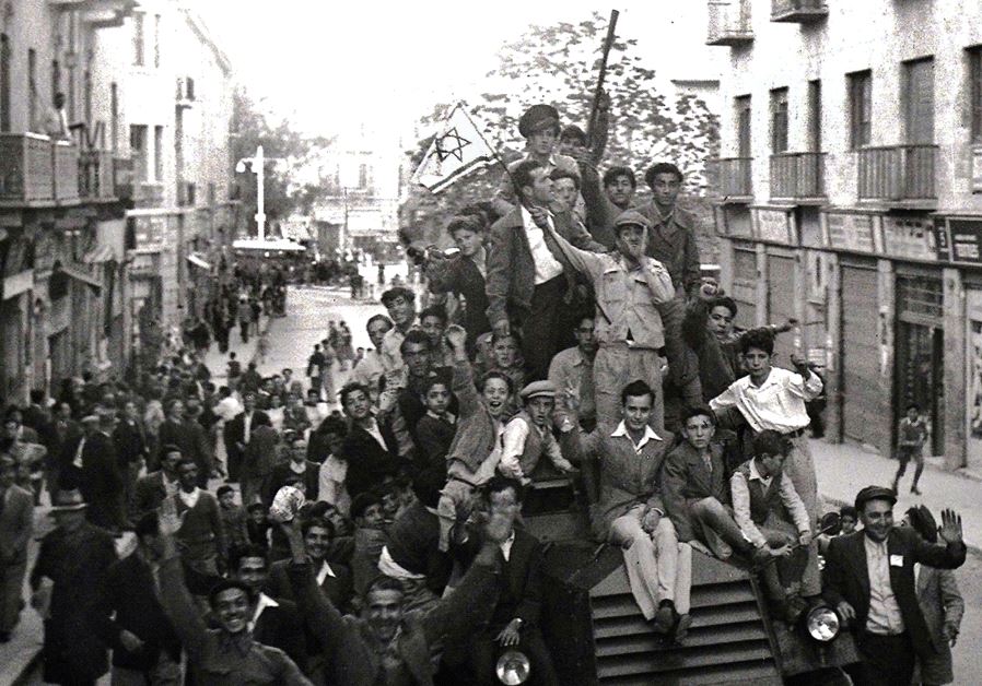 JEWS CELEBRATING the Partition Plan in 1947 in Jerusalem. ‘The UN General Assembly’s 1947 Partition Plan, which triggered the war, similarly injected pathological perspectives into our national identity,’ writes the author