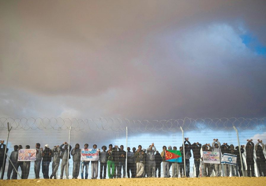 AFRICAN MIGRANTS being held at the Holot detention center in the Negev demonstrate last month for better conditions.