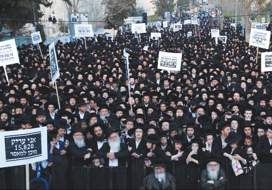 ULTRA-ORTHODOX protesters take part in a demonstration in Jerusalem last night against yeshiva students serving in the army.