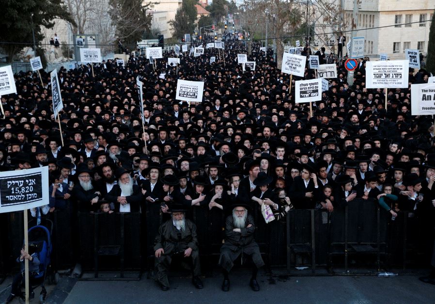 Ultra-Orthodox Jewish protesters take part in a demonstration against members of their community serving in the Israeli army, in Jerusalem