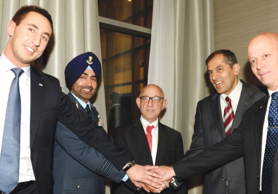 SMILING IN HERZLIYA on Tuesday night are (from left) ISDEF President Tomer Avnon, Indian Ambassador Pavan Kapoor, acting NSC head Yaakov Nagel, Indian military attaché Tejpal Singh and ISDEF marketing CEO Jonas Zilkin.