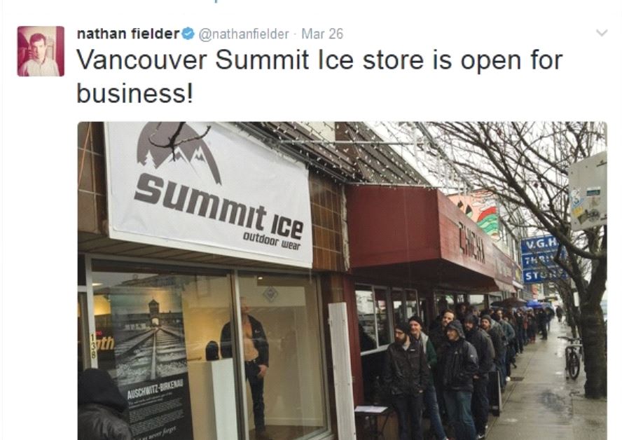 PEOPLE LINE UP to enter the new Summit Ice store in Vancouver, Washington, where they can trade in their old jackets and learn about the Holocaust at the same time