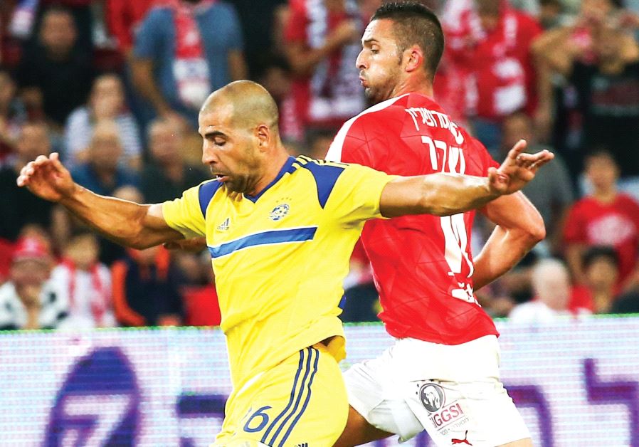 Maccabi Tel Aviv defender Tal Ben-Haim (left) and Hapoel Beersheba striker Ben Sahar (right) are set to clash once more on Saturday when the Premier League’s top two teams meet at Turner Stadium.