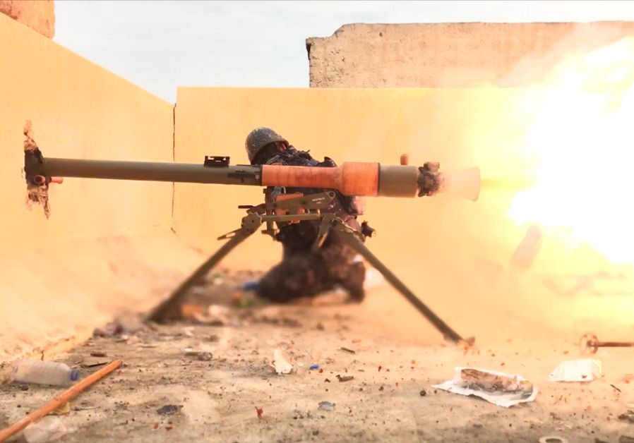 Soldier firing at ISIS targets in northern Iraq