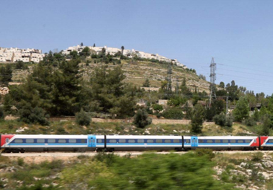 An Israel Railways train passes through Ein Yael in Jerusalem