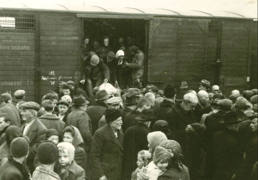 Hungarian Jews disembark from trains at the Auschwitz-Birkenau death camp in the summer of 1944