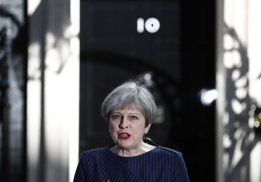 Britain's Prime Minister Theresa May speaks to the media outside 10 Downing Street, in central London, Britain April 18, 2017