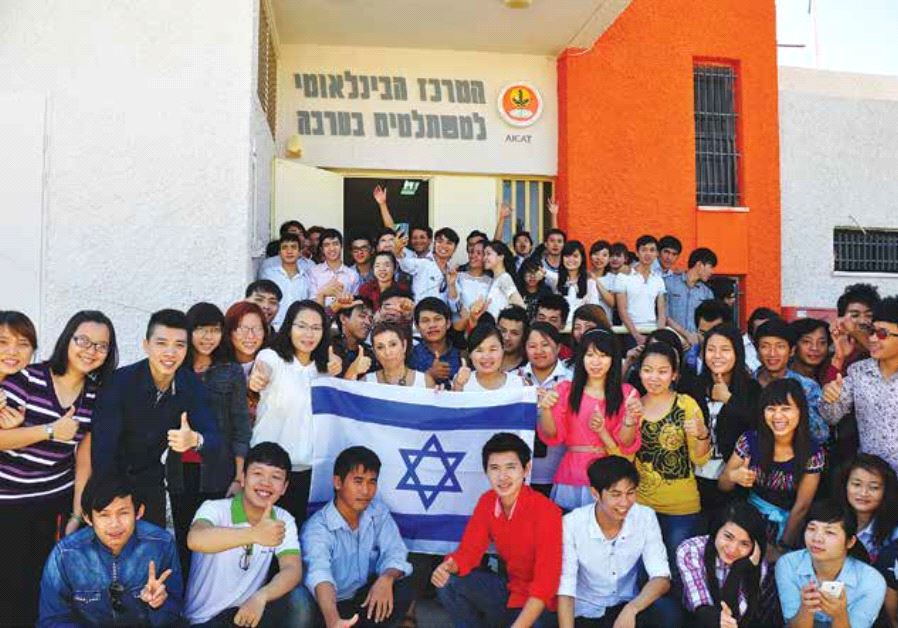 AICAT students show their support for Israel in the Arava with AICAT director Hanni Arnon