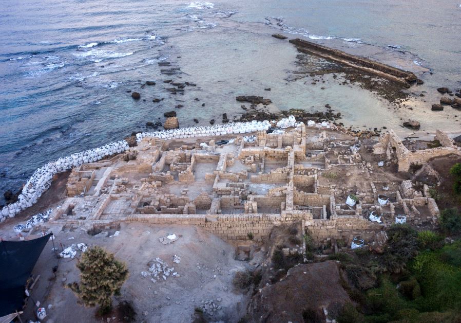 An aerial view of the work in the Caesarea National Park's harbor.