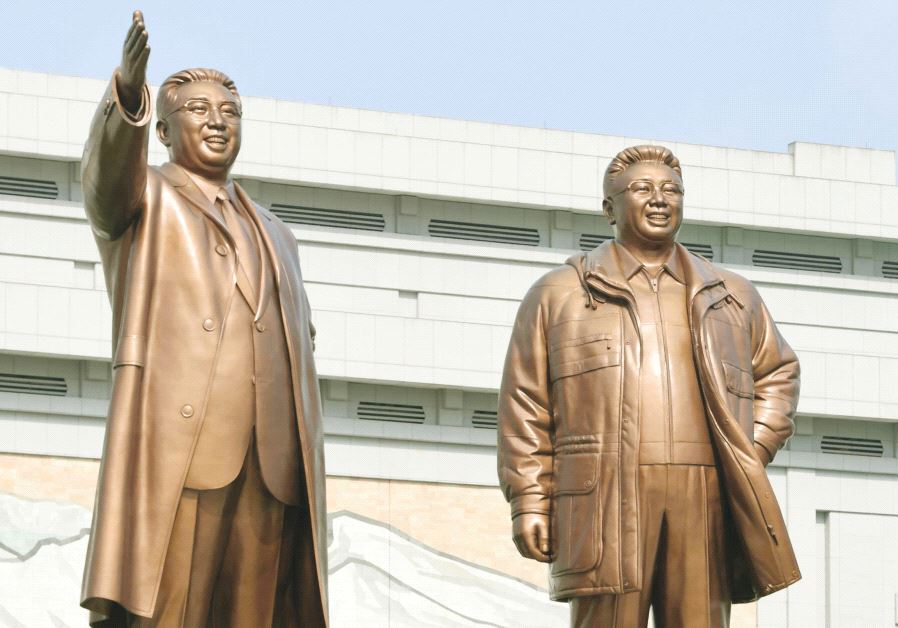 Bronze statues of North Korea’s late founder Kim Il-sung and late leader Kim Jong Il as they offer flowers to the statues in Pyongyang this week, to mark the 85th anniversary of the founding of the Korean People’s Army
