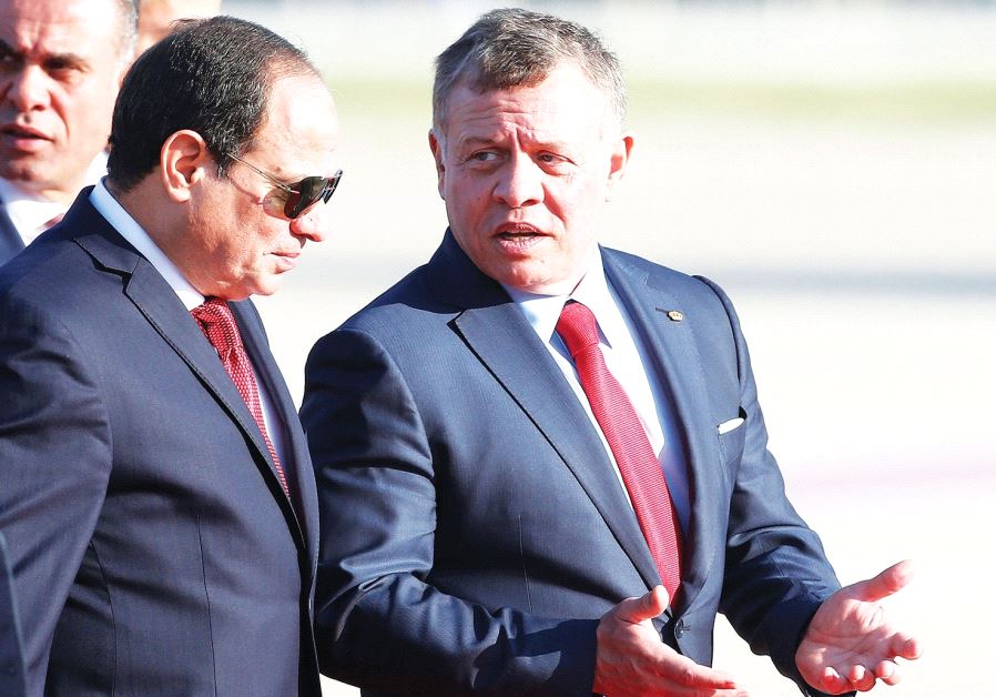 JORDAN’S KING Abdullah II welcomes Egypt’s President Abdel Fattah al-Sisi during a reception ceremony
