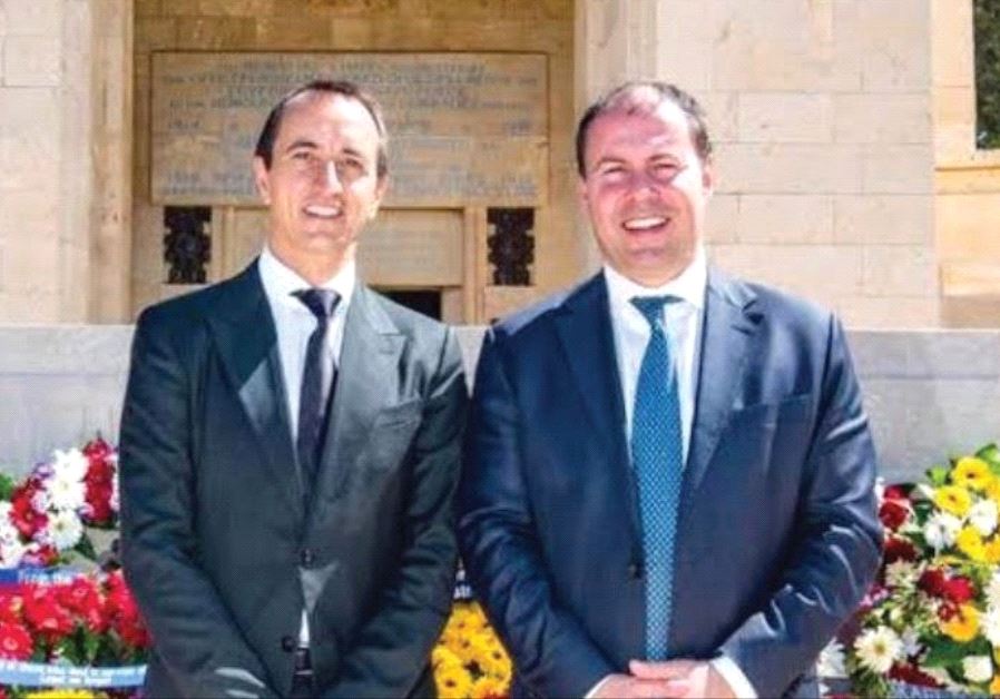 AUSTRALIAN AMBASSADOR Dave Sharma (left) and Josh Frydenberg, Australian minister for environment and energy, at the Commonwealth War Graves Cemetery in Jerusalem where many Jewish Australian and New Zealand soldiers are buried