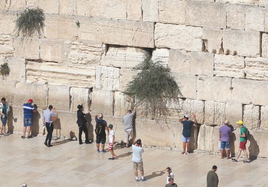 People at the Western Wall in Jerusalem