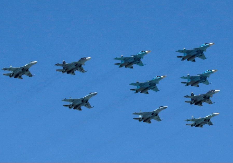 Russian Sukhoi Su military jets, including Su-35S Super-Flanker fighters.