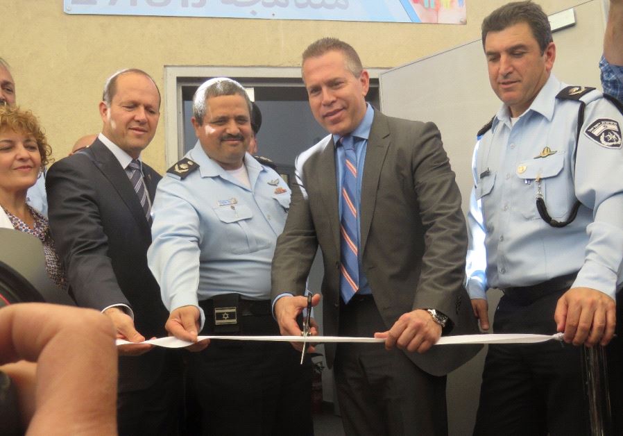 Jerusalem Mayor Nir Barkat, Police Commissioner Roni Alsheikh, Public Security Minister Gilad Erdan and Jerusalem Police Chief Yoram Halevy attend an inaugural ceremony for the first police station in Shuafat refugee camp on Sunday