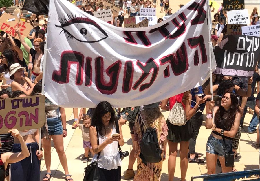 People take part in a "SlutWalk" protest, during which several hundred participants march through the centre of Tel Aviv, May 12, 2017.