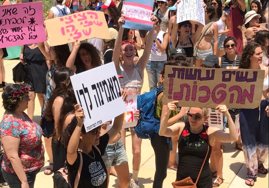 People take part in a "SlutWalk" protest, during which several hundred participants march through the centre of Tel Aviv, May 12, 2017.