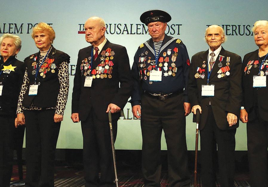 A group of Jewish World War II veterans is awarded a certificate of appreciation by ‘The Jerusalem Post’ and the American Forum of Russian Jewry on May 7, during the sixth annual Jerusalem Post conference in New York