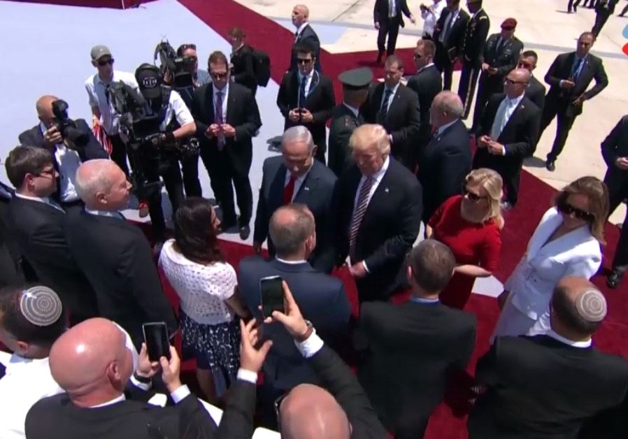 US President Donald Trump and his wife Melania shaking hands with Israeli ministers
