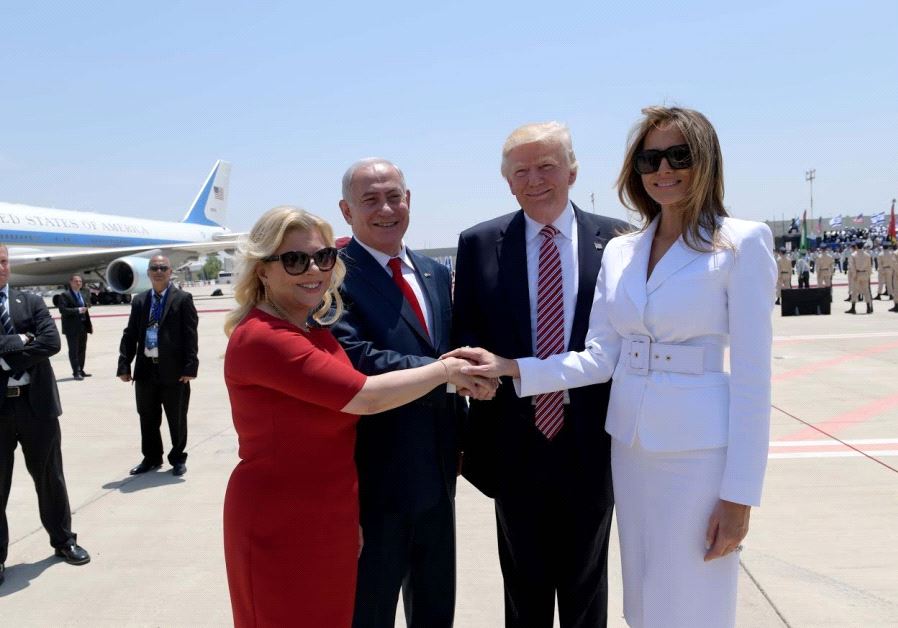 Prime Minister Benjamin Netanyahu and his wife, Sara, (L) greet US President Donald Trump and First Lady Melania Trump at Israel's Ben-Gurion Airport, May 22, 2017