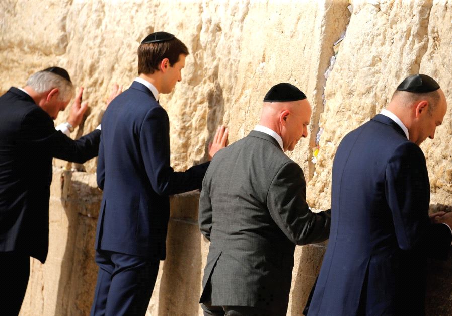 US SECRETARY of State Rex Tillerson (from left), White House senior adviser Jared Kushner, National Security Adviser H.R. McMaster and chief economic adviser Gary Cohn leave notes at the Western Wall.