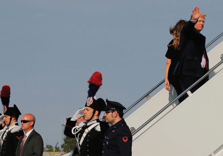 US PRESIDENT Donald Trump boards a plane to head home after a speech in Sicily