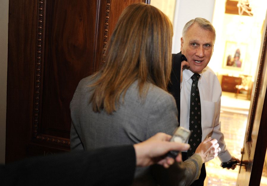 Senate Minority Whip Jon Kyl (R-AZ) talks to reporters as he walks to his office after meeting with Minority Leader Mitch McConnell (not pictured) at the U.S. Capitol in Washington, December 21, 2010