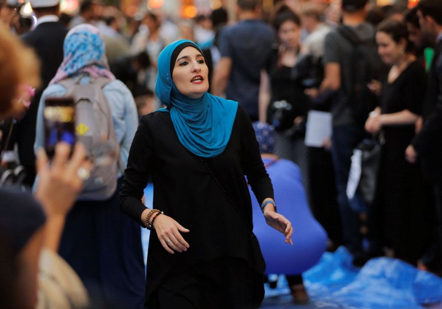 Activist Linda Sarsour prepares for the beginning of a demonstration and Iftar celebration during Ramadan outside of Trump Tower in New York, U.S., June 1, 2017