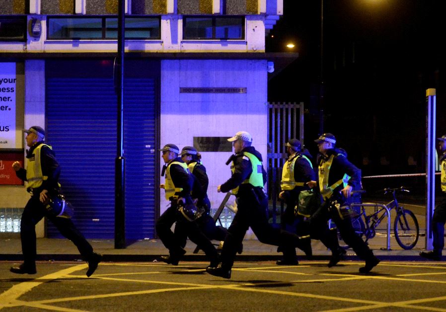 Police attend to an incident on London Bridge in London, Britain, June 3, 2017.