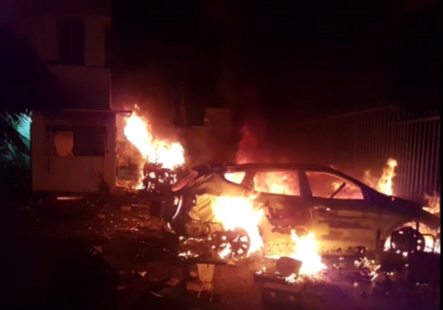 Cars set on fire in a riot in Kafr Kasim.