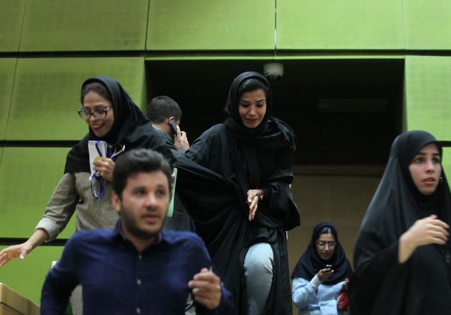 Women are seen inside the parliament during an attack in central Tehran, Iran, June 7, 2017. 