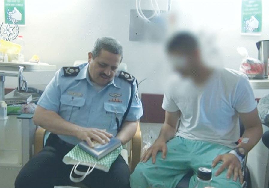 POLICE COMMISSIONER Roni Alsheikh visits an officer who was wounded in a terrorist attack in the Old City’s Muslim Quarter.
