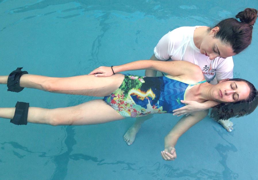 Viktoria Simonyan administers Watsu water therapy