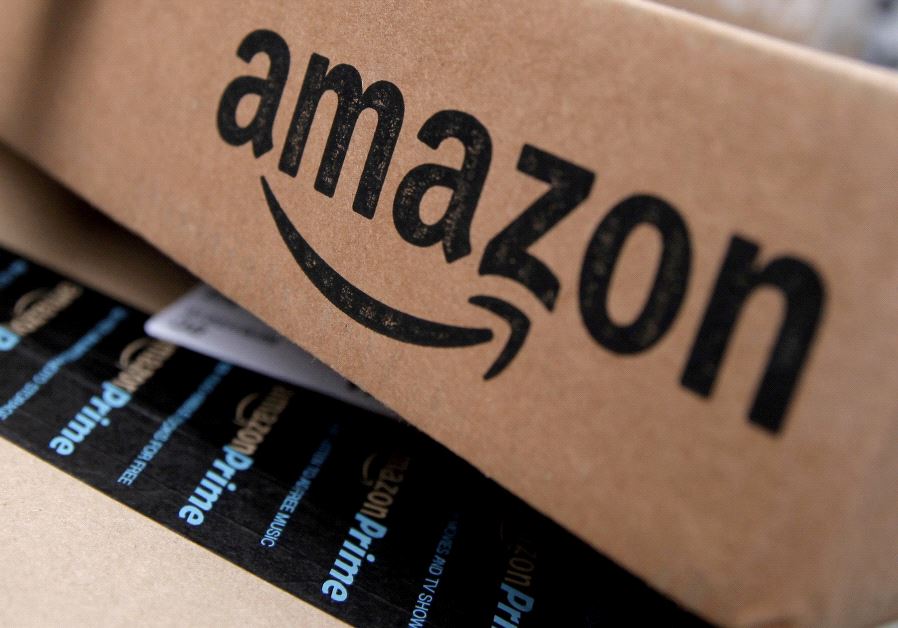Amazon boxes are seen stacked for delivery [File]