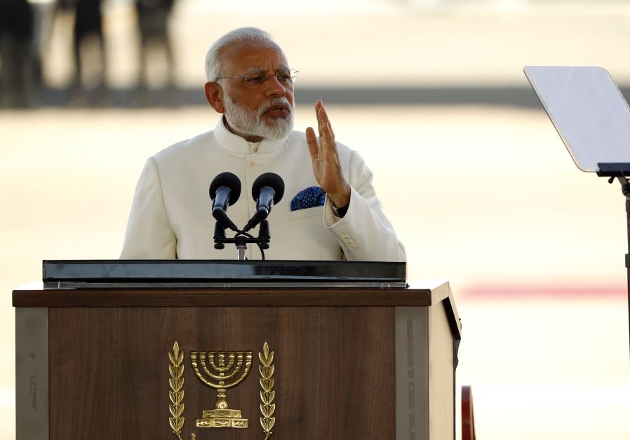 Indian Prime Minister Narendra Modi speaks during his welcoming ceremony in the presence of his Israeli counterpart Benjamin Netanyahu (not in frame) at Ben-Gurion International airport near Tel Aviv on July 4, 2017