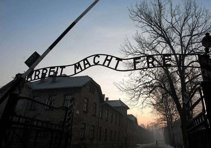 The Nazi slogan "Arbeit macht frei" (Work sets you free) is pictured at the gates of the former Nazi German concentration and extermination camp Auschwitz-Birkenau in Oswiecim, Poland January 27, 2017